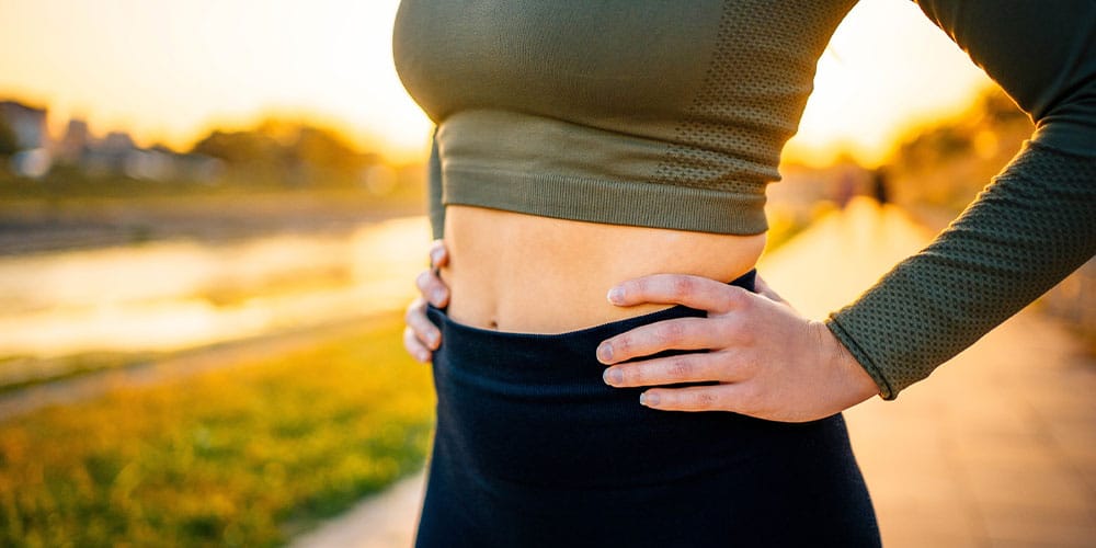 woman working out after her tummy tuck in Atlanta, GA